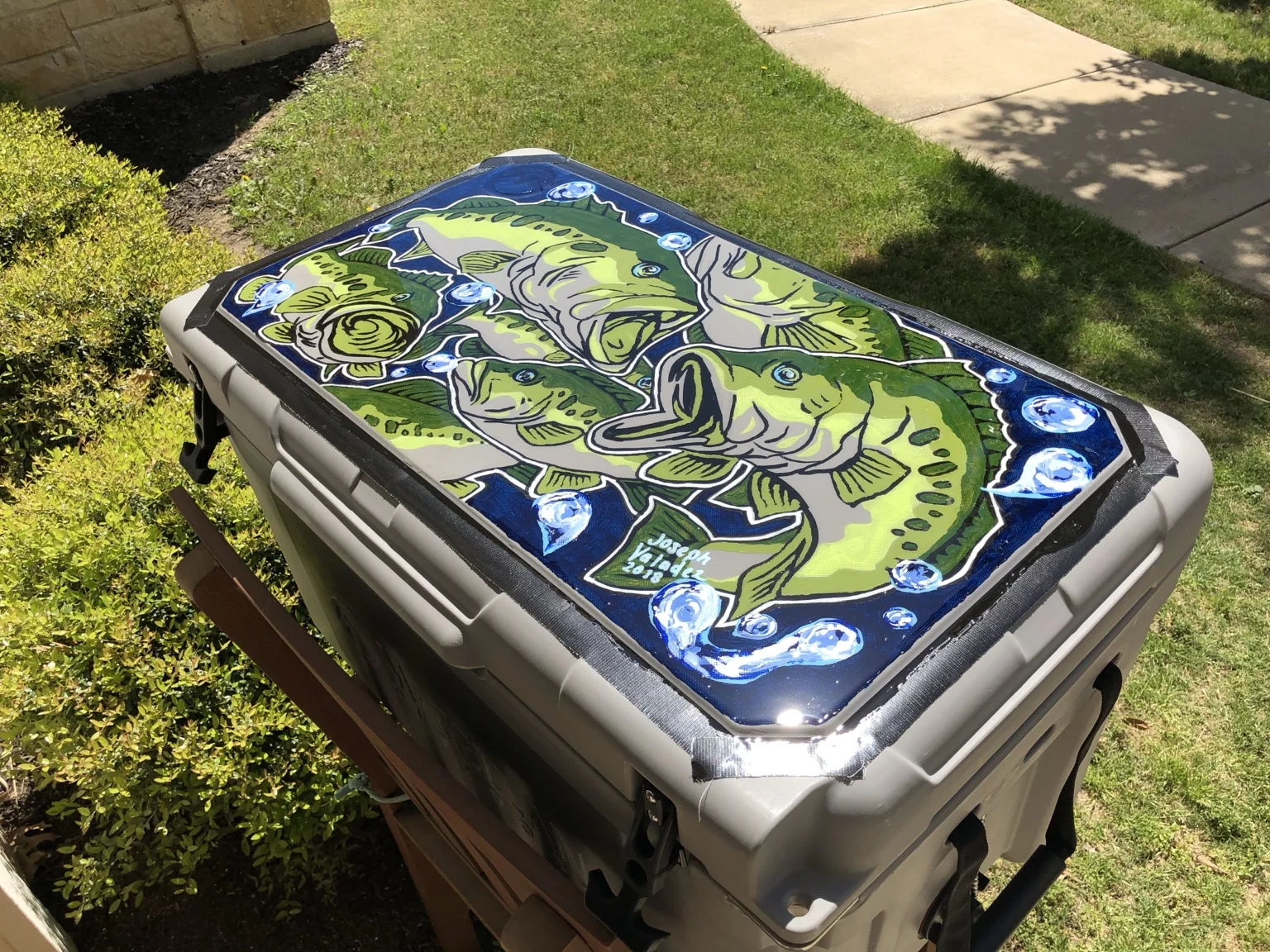 Bass fishing artwork painted on a cooler
