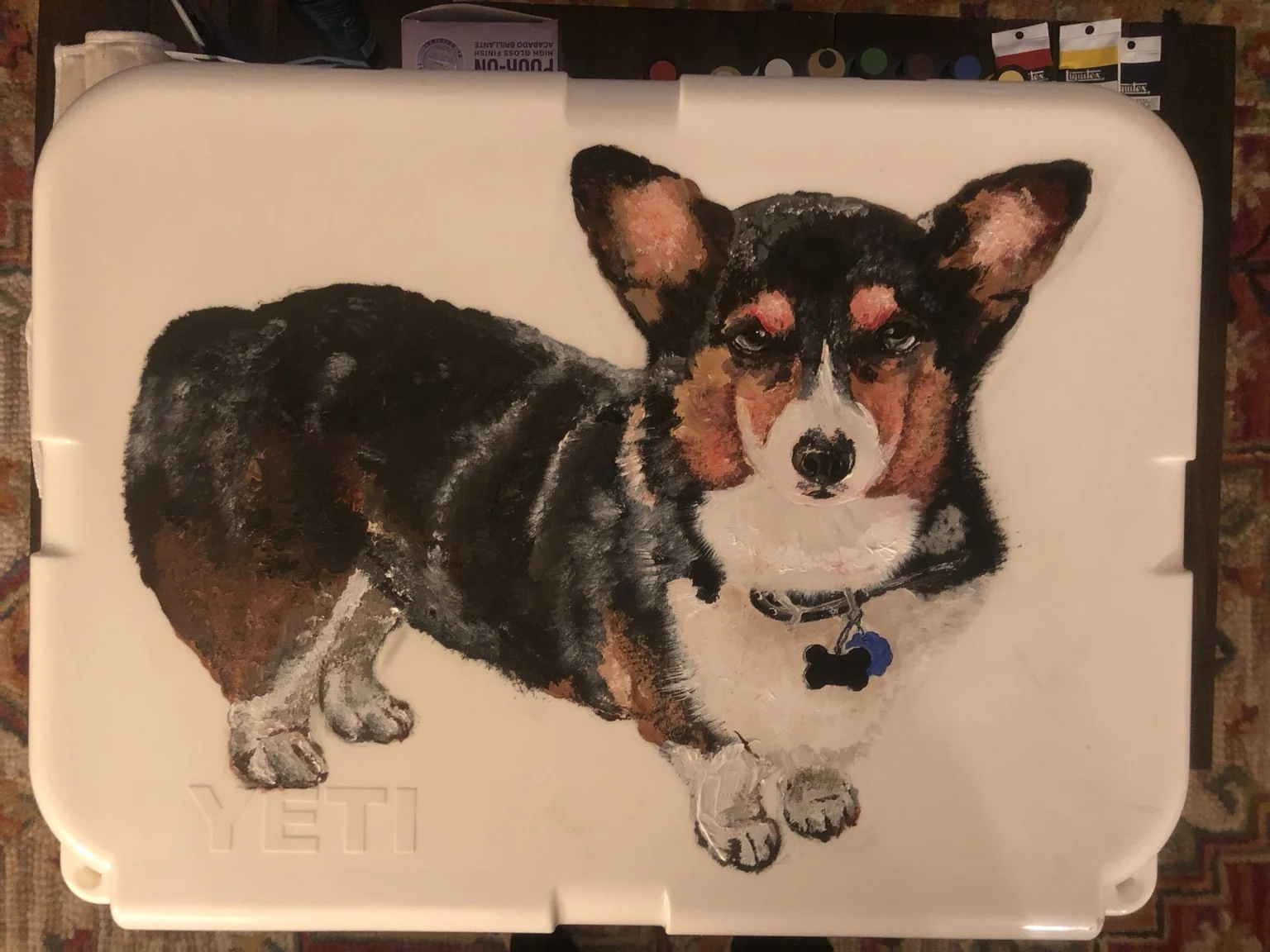 Memorial corgi portrait painted on a cooler