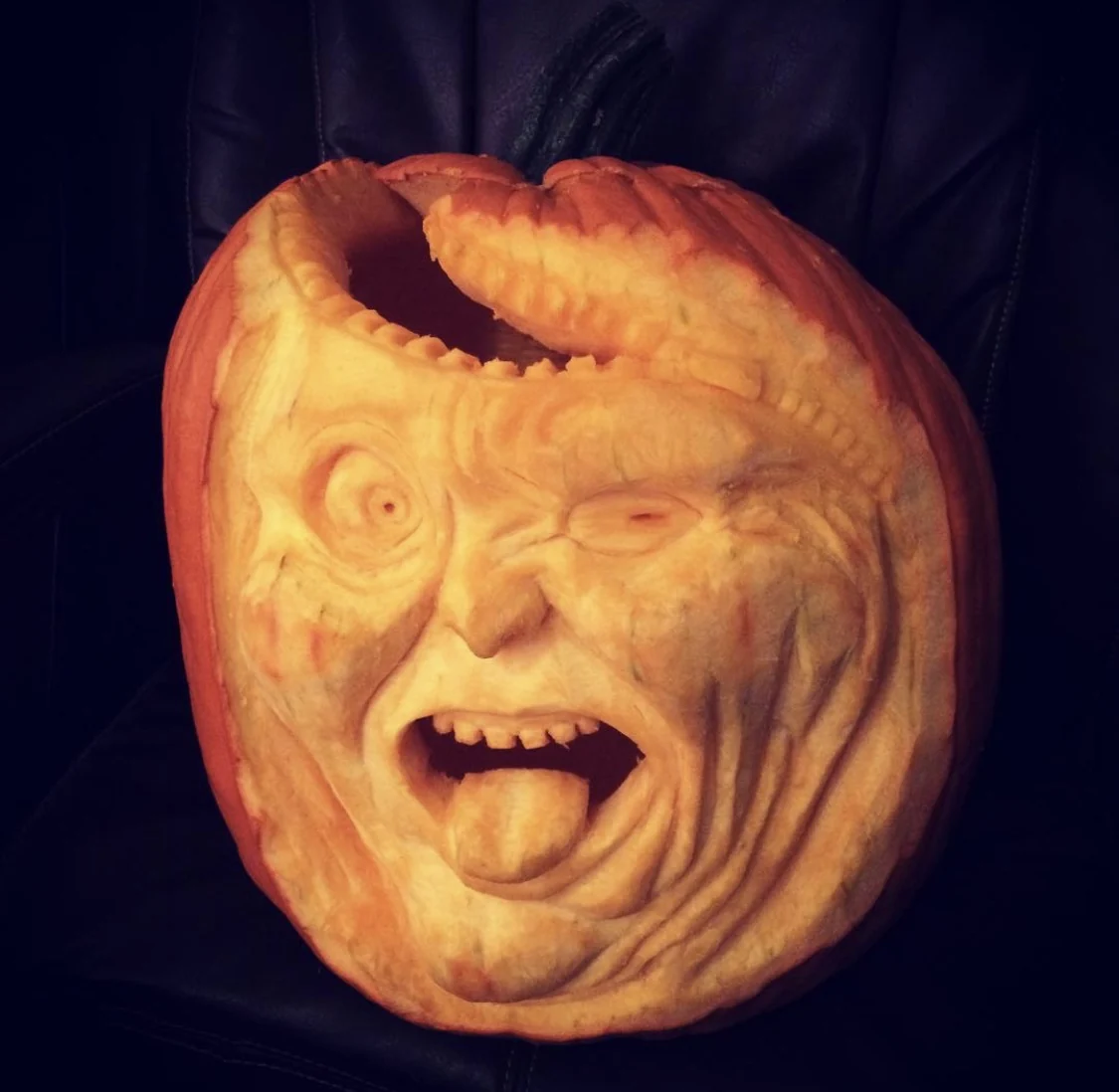 Expressive carved pumpkin portrait