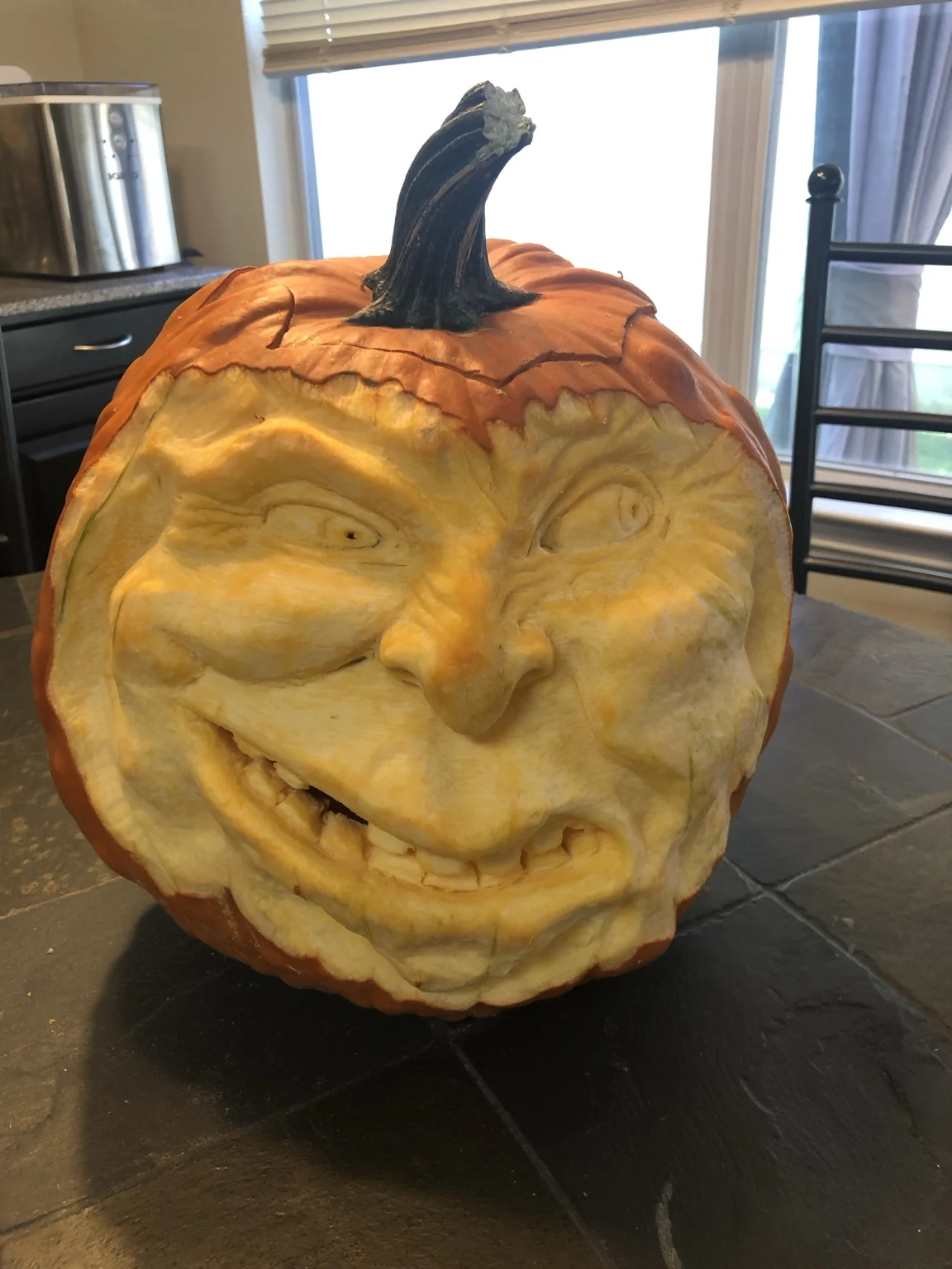 Expressive carved pumpkin portrait
