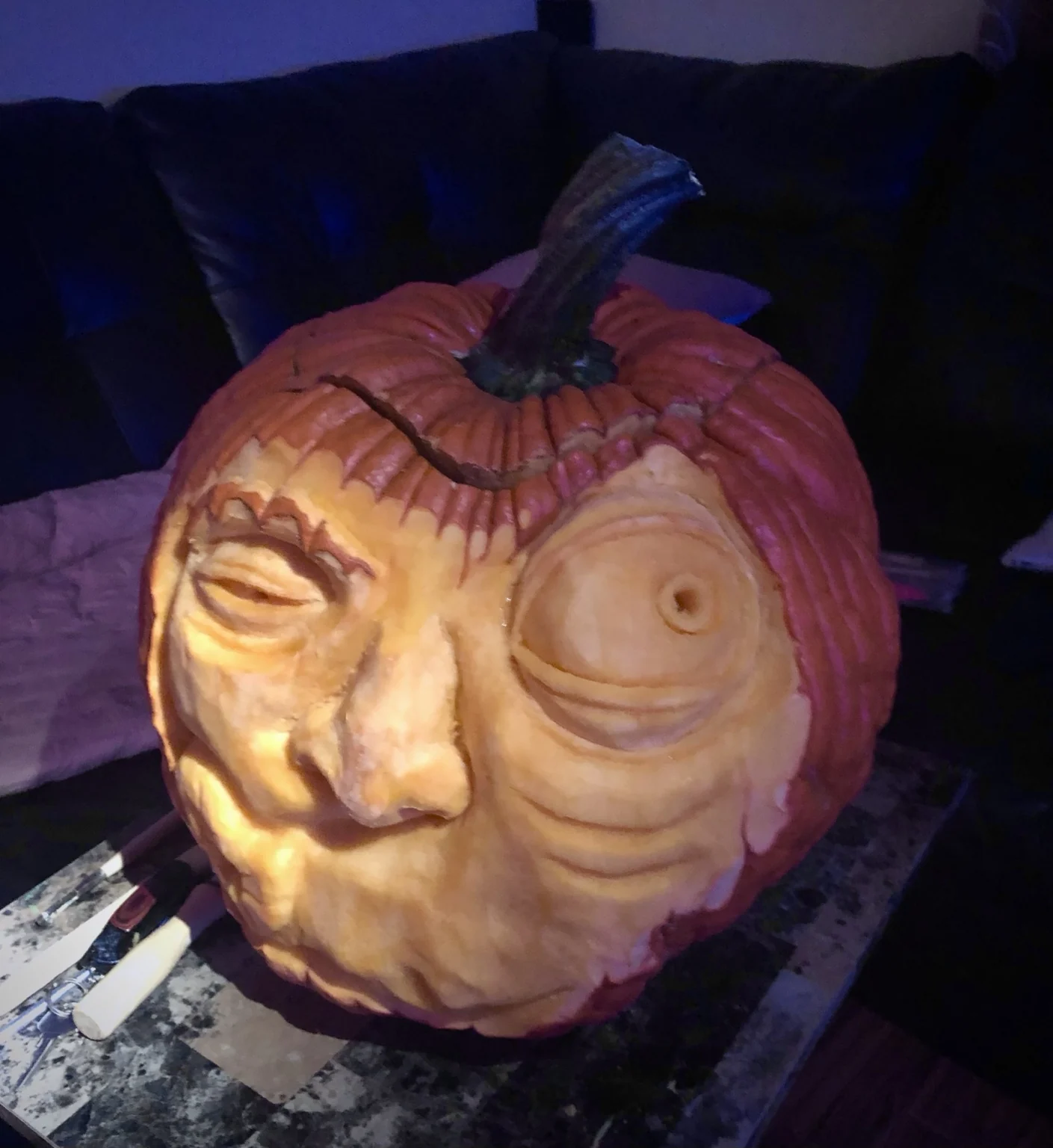 Expressive carved pumpkin portrait